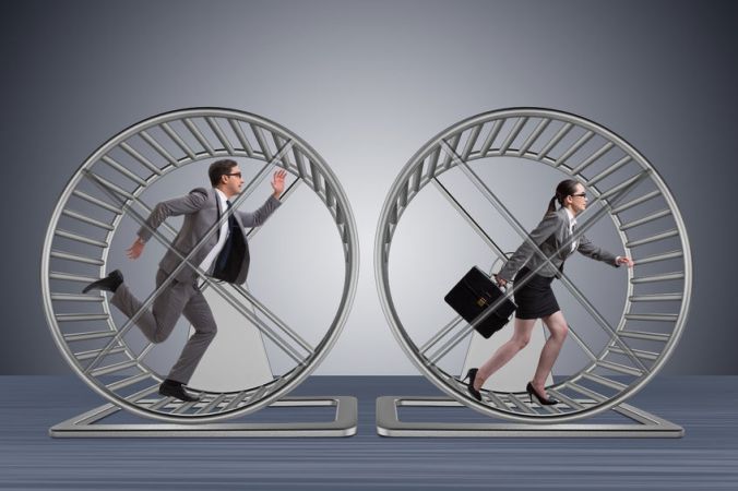 71199148 - business concept with pair running on hamster wheel